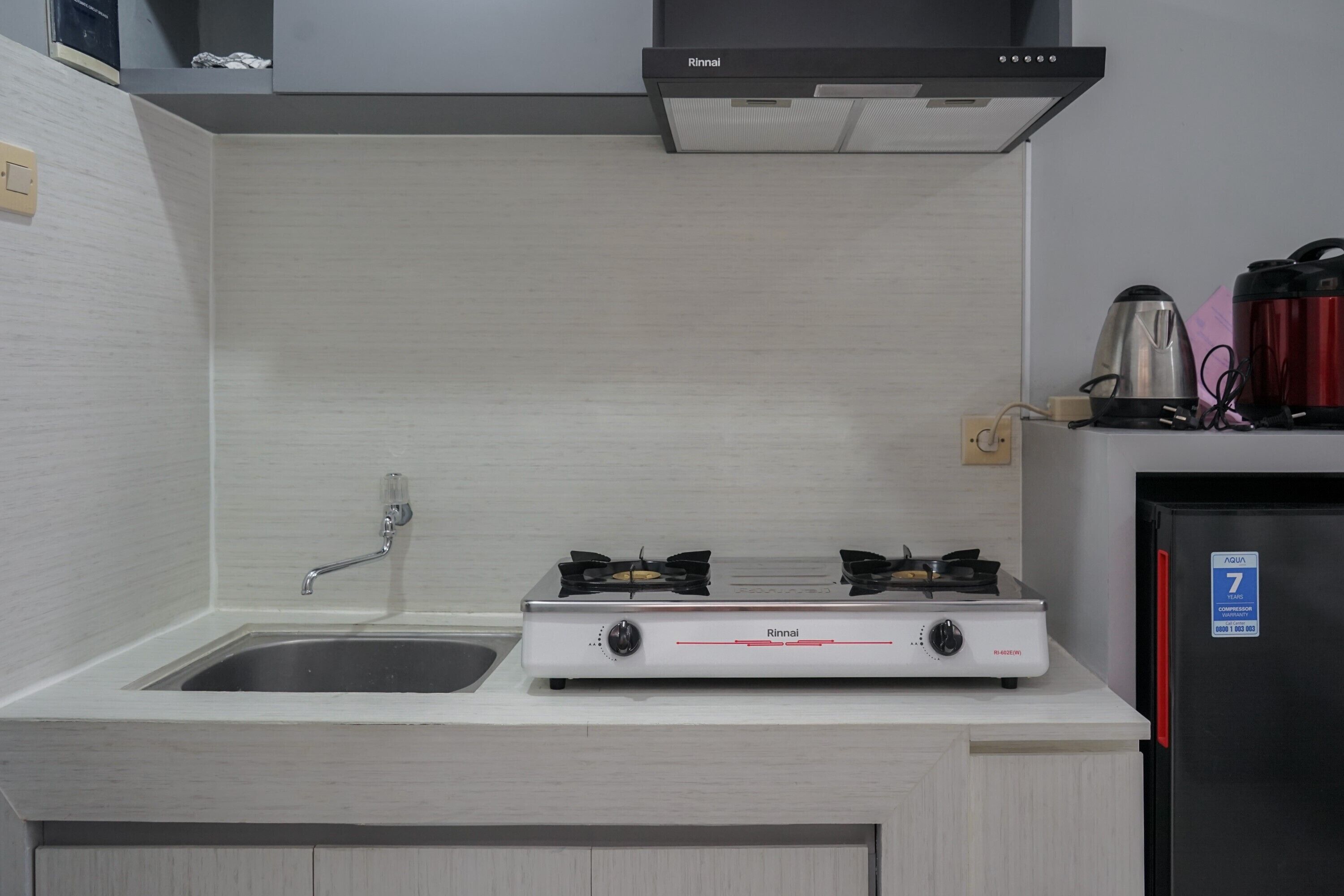 Apartment | Private kitchen | Fridge, stovetop, rice cooker, cookware/dishes/utensils