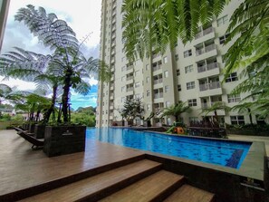 Outdoor pool - Modern 2Br Apartment Without Living Room At Parahyangan Residence (Bandung)