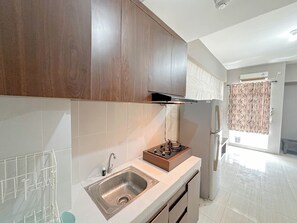 Standard Apartment | Private kitchen - 2Br Best Deal And Homey At Bale Hinggil Apartment (Surabaya)