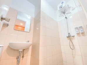 Standard Apartment | Bathroom - Homey & Restful Studio At Tamansari Panoramic Apartment (Bandung)