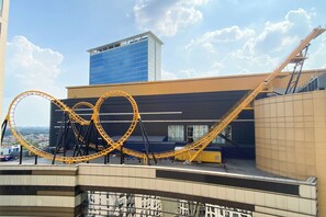 Experience the unique architecture of this modern building, featuring a curved design and a flat roof.