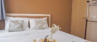 Homey And Cozy 3Br At Meikarta Apartment