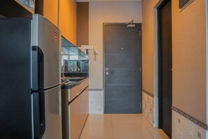 Standard Apartment | Private kitchen - Comfortable Studio At Tamansari Semanggi Apartment (Jakarta)