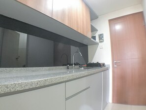 Private kitchen - Wonderful 1Br Without Livingroom At Pavilion Permata Apartment (Surabaya)