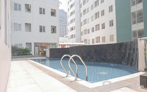 Outdoor pool - Wonderful 1Br Without Livingroom At Pavilion Permata Apartment (Surabaya)