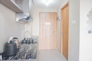 Private kitchen - Good Choice and Comfy Studio Apartment at LRT City Jatibening (Bekasi)