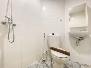 Studio | Bad | Dusj, håndklær og sjampo