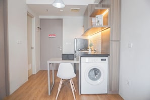 Living area - Cozy And Modern Look 1Br Apartment Vasanta Innopark By Travelio (Cikarang)