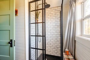Shower, towels, soap, toilet paper
