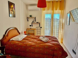 2 dormitorios, tabla de planchar con plancha, wifi y ropa de cama