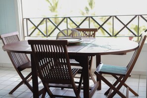 Enjoy a casual meal in this dining area with a round table and four chairs.