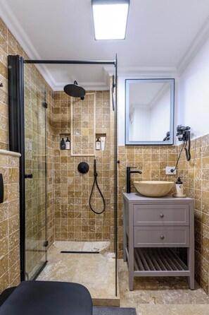 Shower, eco-friendly toiletries, hair dryer, bidet