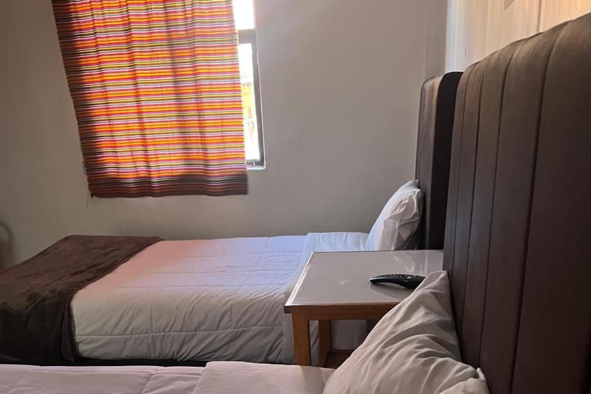 Desk, free WiFi, bed sheets