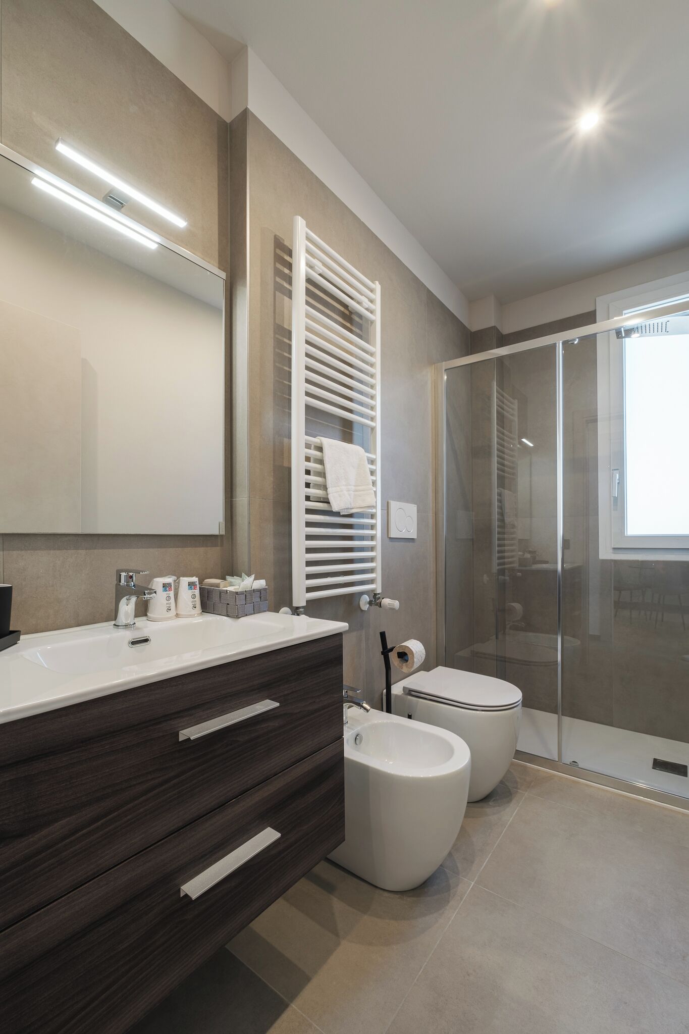Shower, free toiletries, hair dryer, slippers