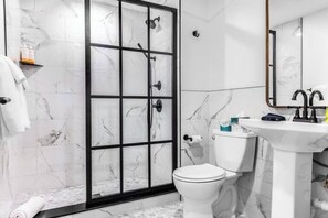 Hair dryer, towels, soap, toilet paper