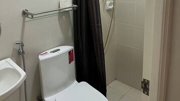 Bidet, soap, toilet paper