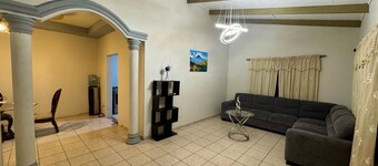 Spacious 4-bedroom hotel suites in delightful San Pedro Sula with WiFi, AC