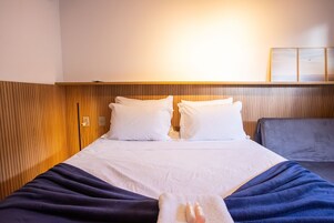 Laptop workspace, free WiFi, bed sheets