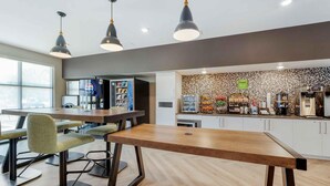 A modern kitchen with a coffee machine, a refrigerator, and a microwave. - Extended Stay America Premier Suites – Phoenix - Chandler – Airport (Chandler)