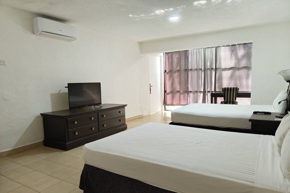 Comfort Quadruple Room, 2 Double Beds, Non Smoking | Desk, WiFi (free), bed sheets