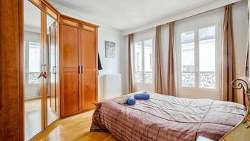 2 dormitorios, tabla de planchar con plancha, Internet y ropa de cama