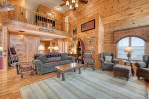 TV connectée, cheminée, lecteur de DVD, table de tennis de table