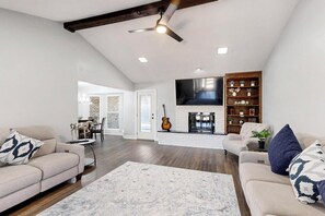 Smart TV, fireplace, foosball