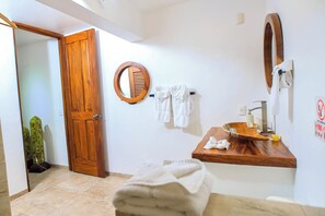 Shower, hair dryer, towels, soap