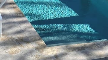Outdoor pool, pool umbrellas, pool loungers