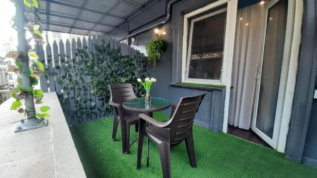 Suite junior, vista a la ciudad | Terraza o patio