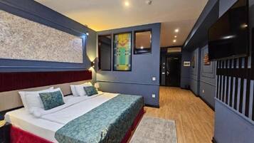 Family Triple Room, City View | Premium bedding, Select Comfort beds, minibar, in-room safe