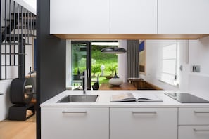 Fridge, microwave, stovetop, coffee/tea maker