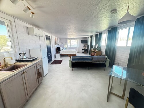 Gorgeously updated casita on beautiful, gated, desert horse property.