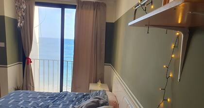 Private double bedroom, with en-suite, with WiFi and stunning sea view.