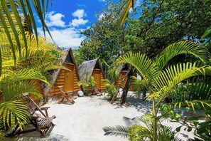 スタンダード バンガロー 共用バスルーム ガーデンビュー | WiFi (無料)、ベッドシーツ