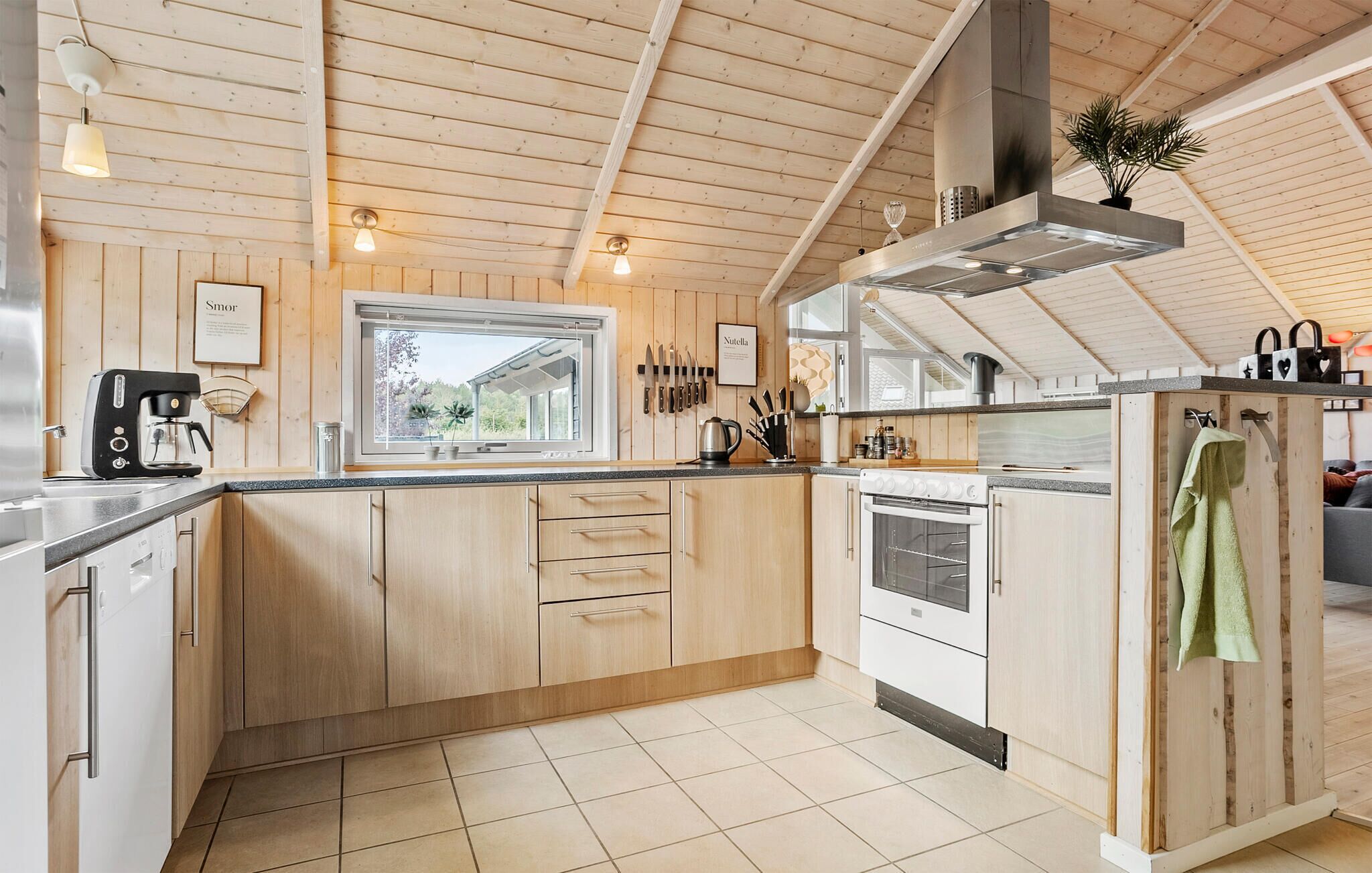 Fridge, stovetop, dishwasher, coffee/tea maker