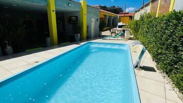 Outdoor pool, open 9:00 AM to 8:00 PM, pool umbrellas, sun loungers