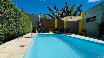 Outdoor pool, open 9:00 AM to 8:00 PM, pool umbrellas, sun loungers