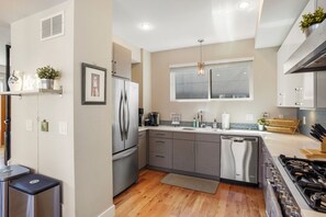 Fridge, microwave, oven, stovetop - Slofax House - Modern 3 Bedroom Home with Rooftop Hot Tub in Sloans Lake Denver (Denver)