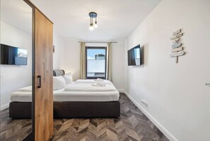 2 Schlafzimmer, Reisekinderbett, kostenloses WLAN, Bettwäsche