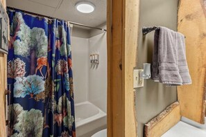 Hair dryer, towels, soap, toilet paper