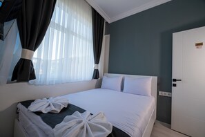 Dobbeltrom – standard | Minibar, strykejern/-brett, wi-fi (inkludert) og sengetøy