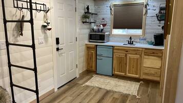 Fridge, microwave, coffee/tea maker, toaster