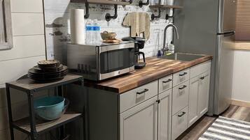 Fridge, microwave, coffee/tea maker, toaster