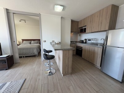 Cozy 1-bedroom with WiFi, fitness room in welcoming Antofagasta