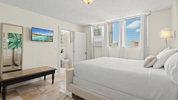 2 habitaciones, tabla de planchar con plancha y cuna de viaje