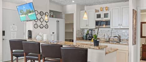 Coffee/tea maker, fridge, microwave, oven