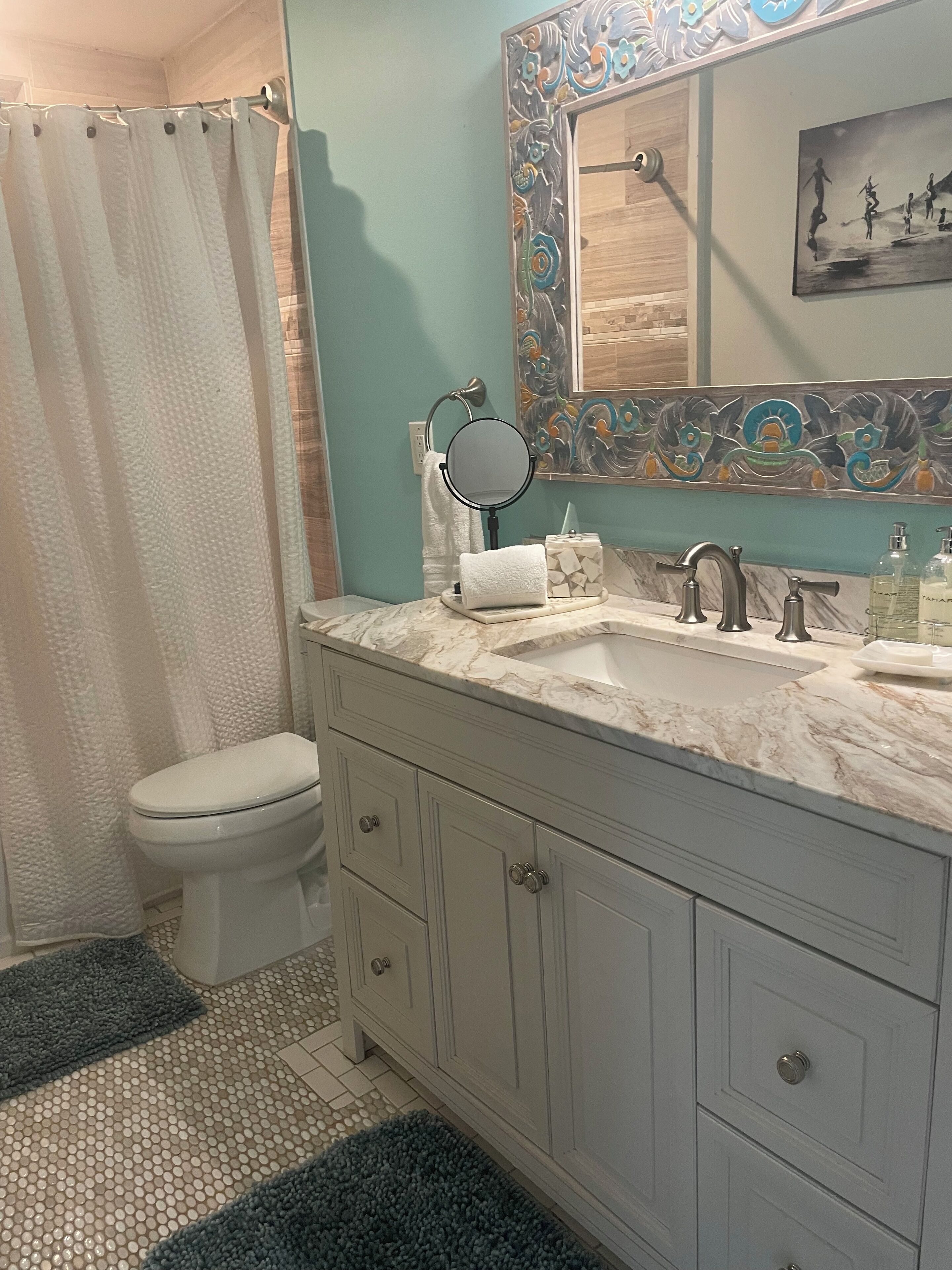 Shower, eco-friendly toiletries, hair dryer, towels