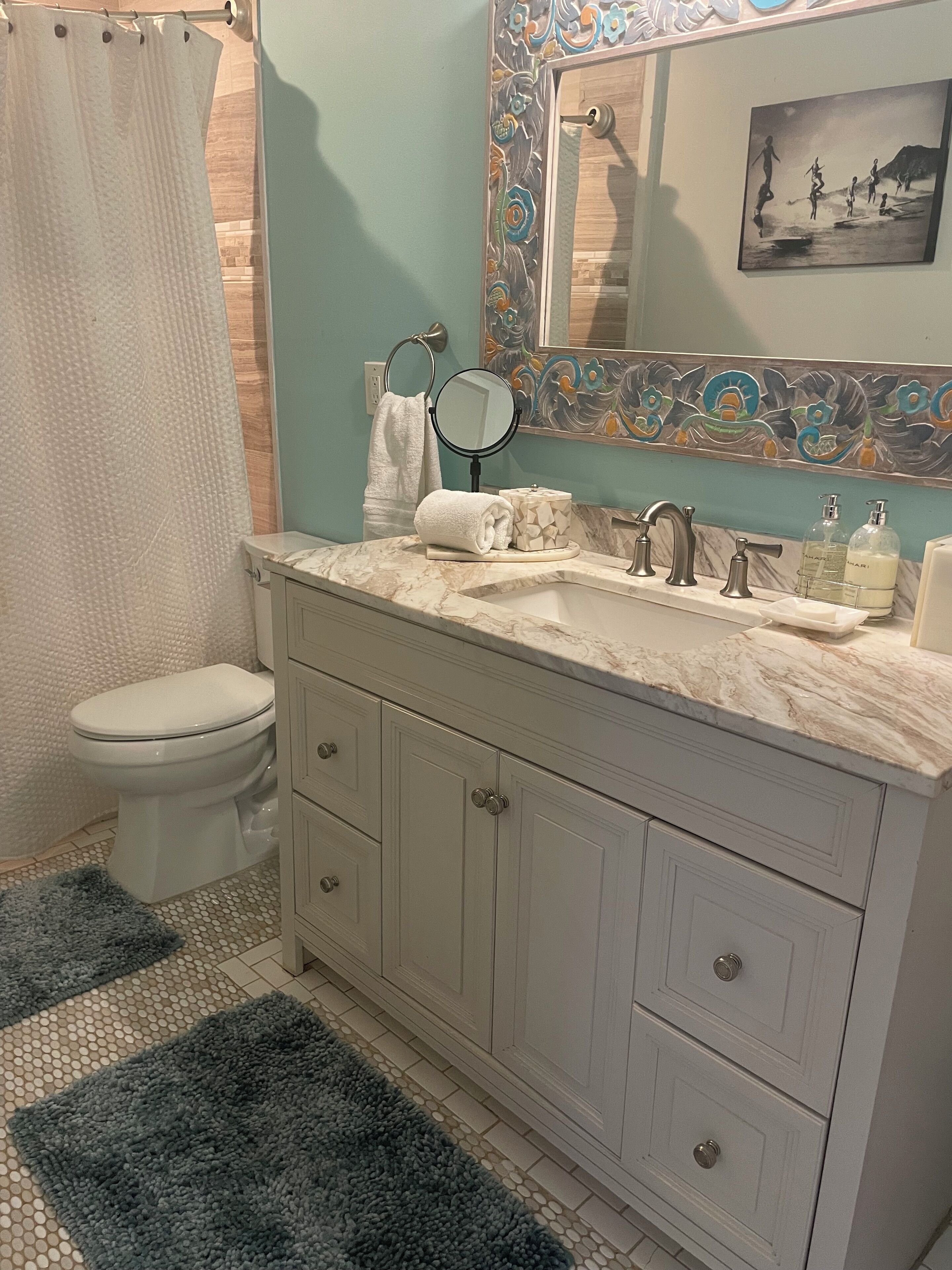 Shower, eco-friendly toiletries, hair dryer, towels