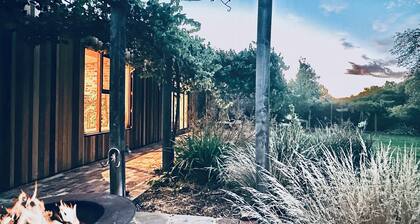 Spacious Eco Home Among Native Gardens – Peaceful Family Retreat